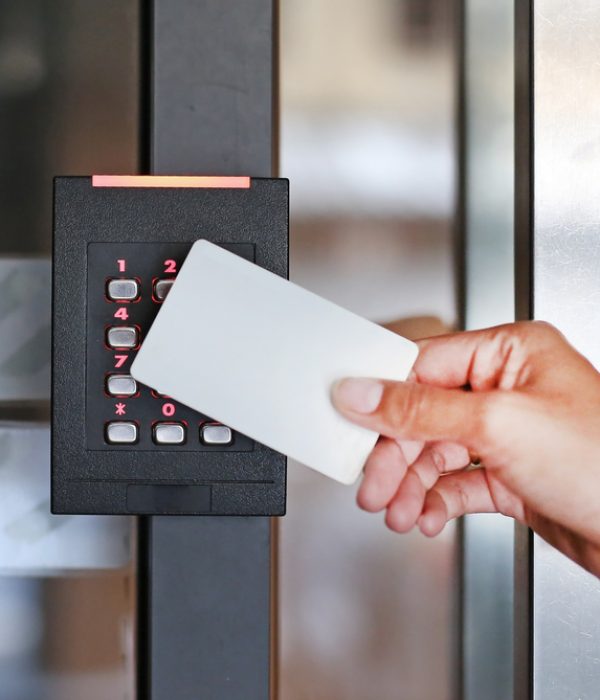 Door,Access,Control,-,Young,Woman,Holding,A,Key,Card